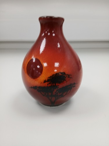 Poole pottery red african - african, sky
